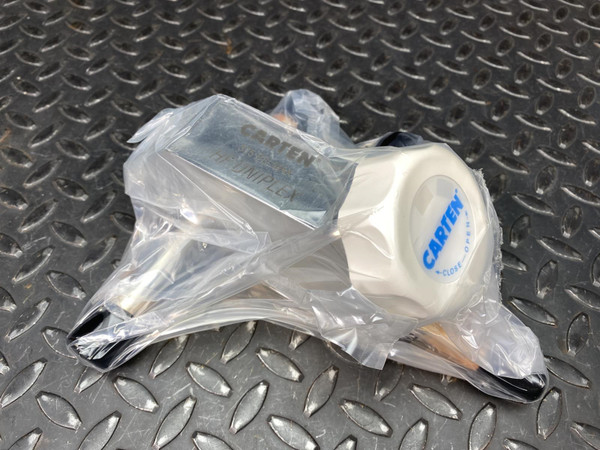 Carten UFC750/500-10PC1FSM uniplex valve in clear plastic packaging with white control knob.