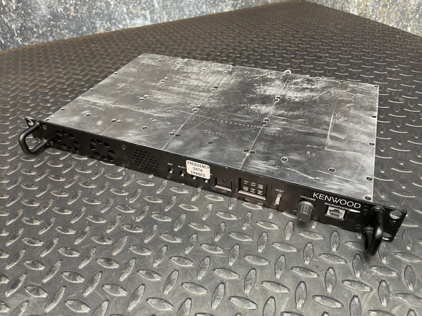 Kenwood Radio TKR-840-3 UHF HAM Radio from Obtainium Science and Surplus, full front view of the unit placed on a metal grid surface.