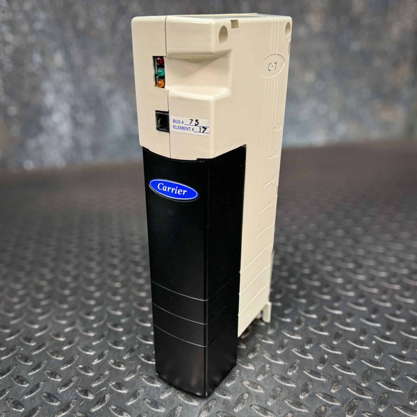 This image displays the Carrier Comfort Controller 6400, model CEPL130201-01, from a front-facing perspective. It shows the device’s sturdy design and practical features, including a two-tone color scheme with a black panel prominently featuring the Carrier logo. The device is equipped with status indicator lights visible at the top, suggesting real-time operational feedback. A label noting "Bus = 7.5, Element = 17" provides details likely related to its configuration within the HVAC system. This controller is designed for effective management and integration within Carrier’s Comfort Network, as indicated by the sleek, professional appearance that would fit seamlessly in commercial HVAC installations.