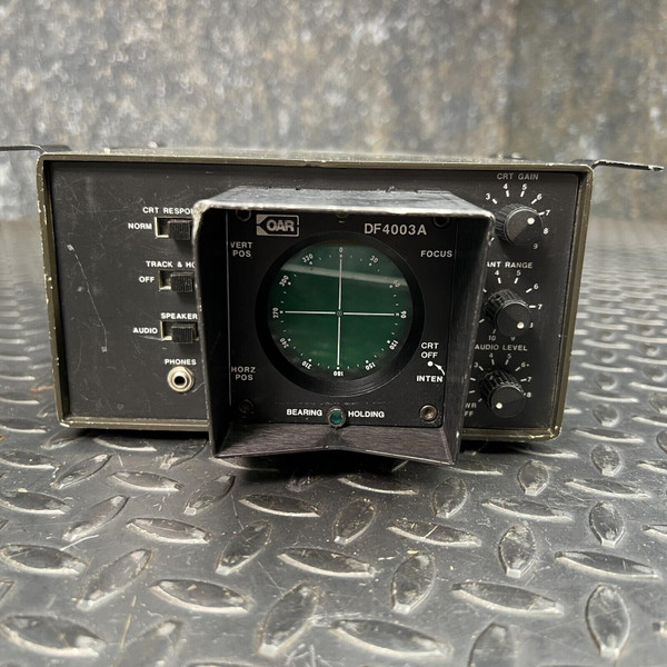 Front view of the OAR DF4003A Doppler Radio Direction Finder Receiver from Obtainium Science and Surplus, showing the central display screen with a green radar-like scope and surrounding control knobs and switches.