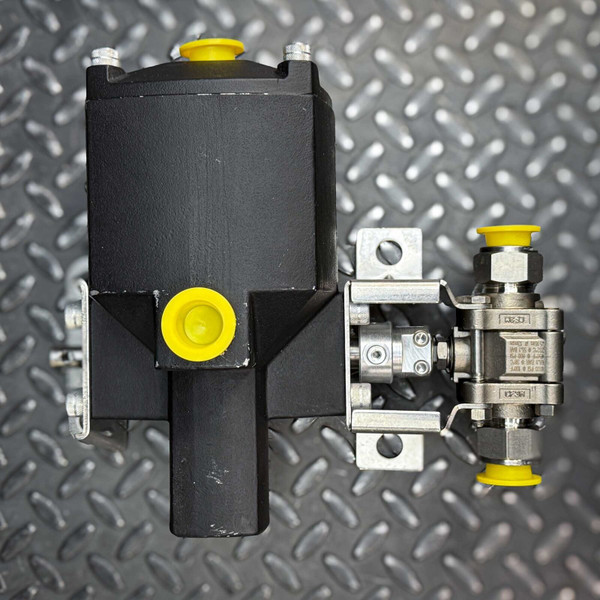 Swagelok Whitey 135DA pneumatic actuator with SS-63MS12 stainless steel ball valve, top view with yellow caps.