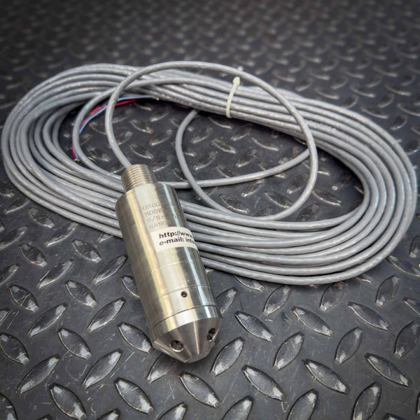 Coiled gray cable attached to a metallic Omega PX78U7-004GI Submersible Pressure Transducer, shown resting on a textured metal surface. The product is from Obtainium Science and Surplus.