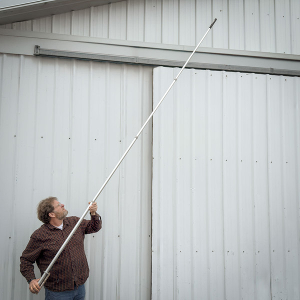 Telescopic probe fully extended showing clean aluminum finish and functional extension mechanism.