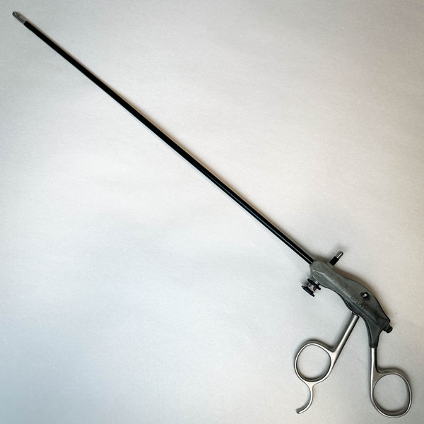 A full view of 5mm Laparoscopic Hook Scissors, R. Wolf 8383.026, featuring a long black shaft, ergonomic handle with finger rings, and a compact cutting tip for use in minimally invasive surgery.