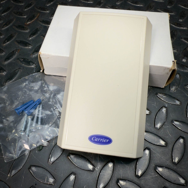 Carrier ZS-CAR Space Sensor for Zone Temperature from Obtainium Science and Surplus shown with mounting screws and anchors beside its box.