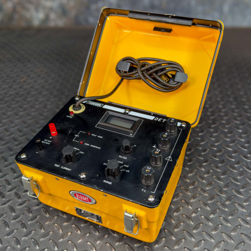 Close-up of an open Biddle Megger Digital Ground Earth Tester from Obtainium Science and Surplus, showing the internal components and control knobs.
