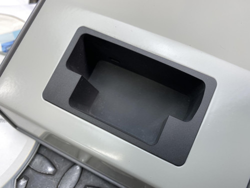 Close-up of the slot in the Thermo ACT5 Dosimeter Reader for EPD Mk2, G, and N2 from Obtainium Science and Surplus, showing its black internal compartment.