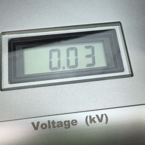 Digital display on the ProTec showing a voltage reading of 0.03 kV, with the label "Voltage (kV)" underneath.