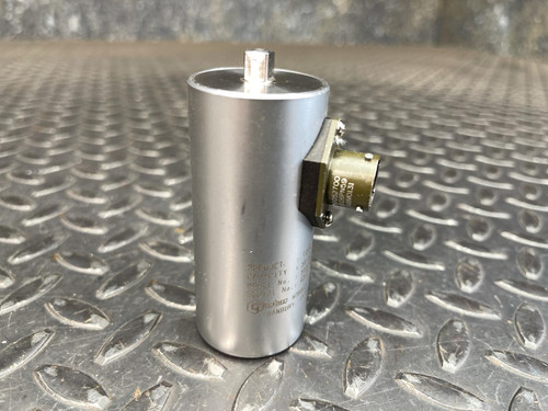 A Norbar 5000-2ETS Torque Transducer – 50 LBF·IN, 1/4" Drive from Obtainium Science and Surplus, standing vertically on a metal surface, showing the smooth cylindrical design with connector on the side.