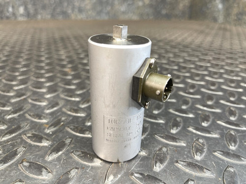 Norbar Torque Transducer 50 LBF·IN – 1/4" Drive from Obtainium Science and Surplus, standing upright on a metal surface with a clear view of the circular connector.