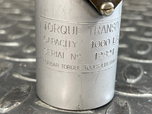 Close-up of the Norbar Torque Transducer's engraved text showing details: "Torque Transducer, Capacity 1000 LBF·IN.", from Obtainium Science and Surplus.