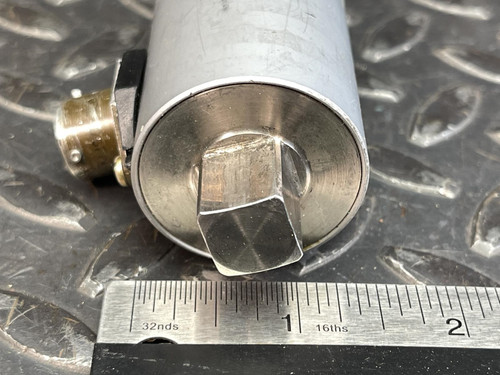 A view of the opposite end of the transducer, featuring a protruding square drive with a ruler measuring its dimensions, highlighting the 1/2-inch drive.