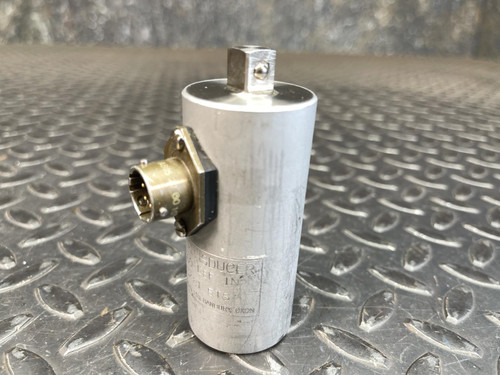 Upright view of the Norbar Torque Transducer 500 LBF·IN – 3/8" Drive In/Out from Obtainium Science and Surplus, with its cylindrical body and side connection port clearly visible against a textured metal background.