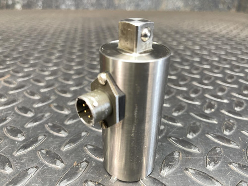 Norbar Torque Transducer with 1/2" drive, displayed upright on a metal surface, from Obtainium Science and Surplus. The cylindrical body features a connector.