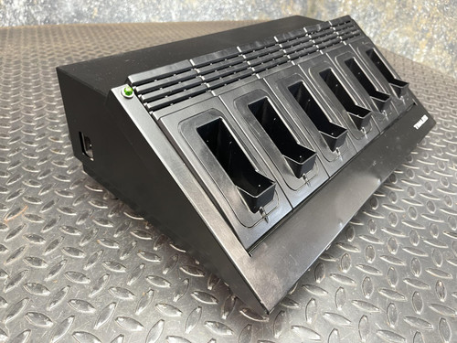 Side view of the Thales battery charger for MBITR tactical radios from Obtainium Science Surplus, displaying the angled design and five charging slots.