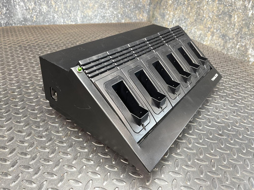 Angled front view of a Thales battery charger for MBITR tactical radios from Obtainium Science Surplus.