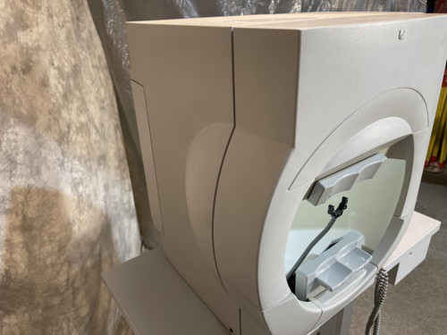 Side view of the Carl Zeiss Meditec Humphrey Visual Field Analyzer 750i, highlighting the unit's compact, rounded design and outer shell.