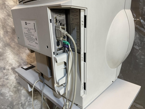 Rear view of the Carl Zeiss Meditec Humphrey Visual Field Analyzer 750i, showing the device's power cables and connections with the back panel open.