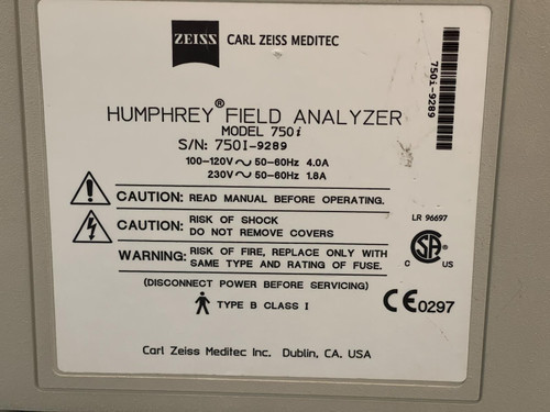 The label on the Carl Zeiss Meditec Humphrey Visual Field Analyzer 750i from Obtainium Science and Surplus, showing technical specifications and safety warnings.