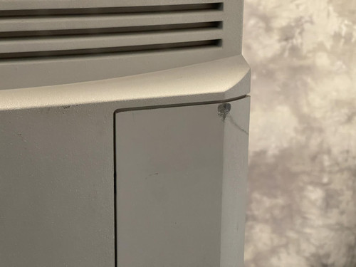 A side detail of the Carl Zeiss Meditec Humphrey Visual Field Analyzer 750i, showing a small scuff near the edge of the panel.