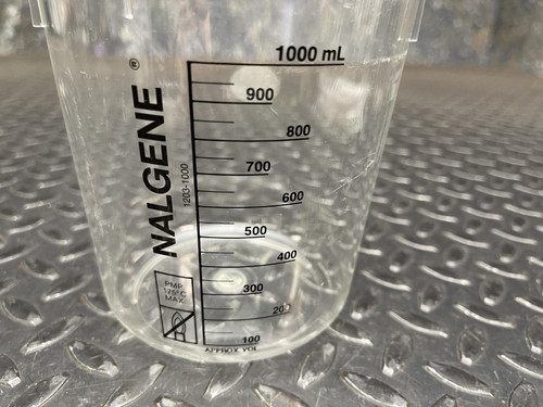 Close-up of the measurement markings on a Nalgene beaker from Obtainium Science and Surplus, showing increments up to 1000 mL.