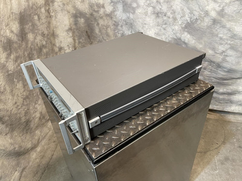 Top perspective of the Wiltron 6769B Synthesized Sweep Generator from Obtainium Science and Surplus, showing its smooth casing and sturdy design.
