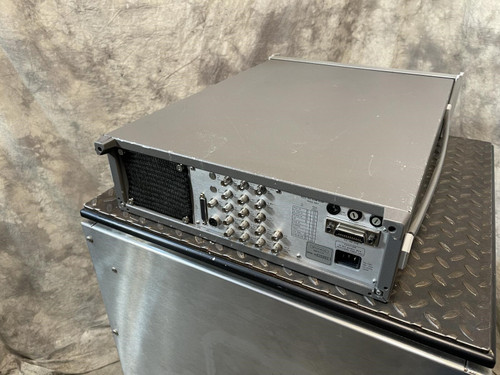 Rear view of the Wiltron 6769B Synthesized Sweep Generator from Obtainium Science and Surplus, showcasing its connectors and ventilation panels.