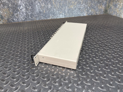A rear view of the National Instruments BNC-2090 terminal block, showing its plain white surface and mounting bracket. Available from Obtainium Science & Industry Surplus.