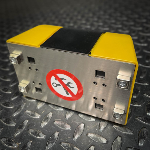 Bottom view of the Crowd Control Warehouse Magnetic Retractable Belt Barrier from Obtainium Science and Surplus, showing a metallic plate with a 'No tools' symbol and four screws for secure mounting.