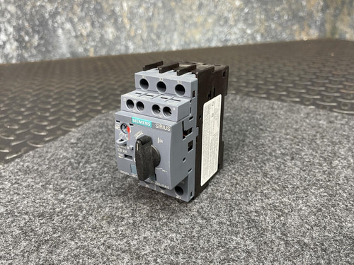 Siemens Sirius 3RV2011-1CA10 Motor Starter Protector from Obtainium Science and Surplus, shown on a gray textured surface with detailed frontal view of the device.