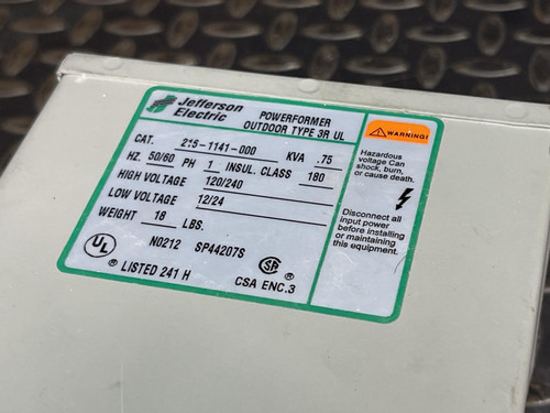 Detailed image of the label on the Jefferson Electric Step-Down Transformer, 216-1141-000 from Obtainium Scientific Surplus, showing specifications and ratings.