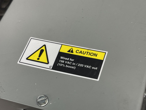 Warning label on the Jefferson Electric Step-Down Transformer, 216-1141-000 from Obtainium Scientific Surplus, indicating caution for specific voltage use.