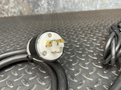 Close-up of the power plug on the Jefferson Electric Step-Down Transformer, 216-1141-000 from Obtainium Scientific Surplus, displaying the prongs and cord.