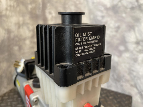 A close-up view of the oil mist filter on the Edwards E2M5 Two-Stage Rotary Vane Vacuum Pump for Lab or Industrial Applications from Obtainium Science and Surplus.