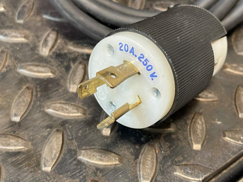 Close-up of the electrical plug of the Edwards E2M5 Two-Stage Rotary Vane Vacuum Pump for Lab or Industrial Applications from Obtainium Science and Surplus.