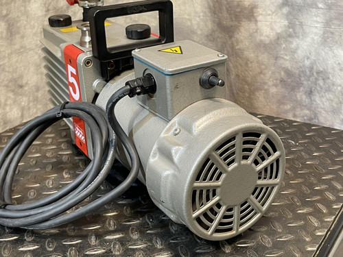 Rear view of the Edwards E2M5 Two-Stage Rotary Vane Vacuum Pump for Lab or Industrial Applications from Obtainium Science and Surplus, showing the cooling fan and motor.