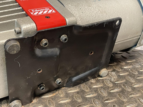 Baseplate of the Edwards E2M5 Two-Stage Rotary Vane Vacuum Pump for Lab or Industrial Applications from Obtainium Science and Surplus, with mounting points visible.