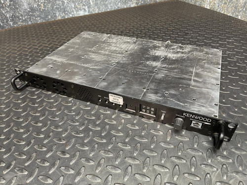 Kenwood Radio TKR-840-3 UHF HAM Radio from Obtainium Science and Surplus, full front view of the unit placed on a metal grid surface.