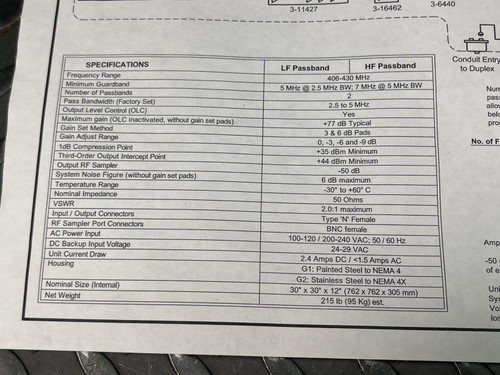 Close-up of the specifications chart from the instruction manual for the TX RX Systems UHF radio frequency booster from Obtainium Science and Surplus.