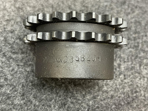 A side view of the Martin D35B20H double-row sprocket, showing manufacturing marks on the surface and the layered teeth structure.
