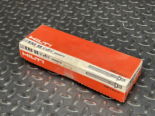 Hilti HAS-R 304 SS Anchor Rod - 1/2"x 6 1/2" from Obtainium Science and Surplus: A closed red box with the Hilti brand and product details printed on it, displayed on a textured metal surface.