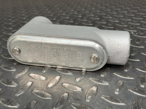 Close-up view of the cover on a 1" Appleton LB37 Conduit Body from Obtainium Science and Surplus, displaying the text "APPLETON RLR, 27, O-Z/GEDNEY FORM 7".