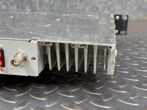 Close-up of the heat sink on the rear side of the Kenwood Radio TKR-840-3 UHF Radio Repeater, highlighting its robust cooling design.