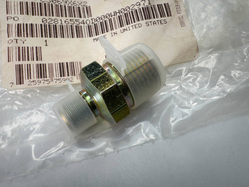 Eaton Weatherhead Steel Hex Nipple Fitting, 3/8" x 1/8" NPT Male from Obtainium Science and Surplus, shown inside a plastic bag with a barcode label in the background. The fitting has a hexagonal nut and threaded ends.