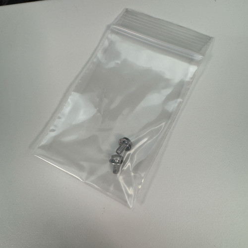 A small plastic bag containing two screws, intended for use with the National Instruments SCB-68 I/O terminal block connector. This accessory is available from Obtainium Science & Industry Surplus.