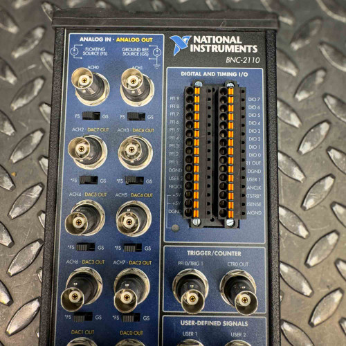 Close-up of the National Instruments BNC-2110 terminal block from Obtainium Science and Surplus, highlighting the input and output connectors and control interface.