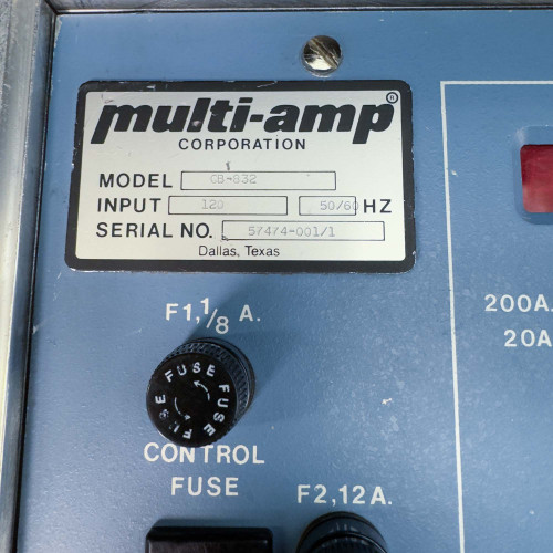 A detailed view of the Megger Multi-Amp CB-832 Circuit Breaker Tester's identification plate, indicating the model number, input specifications, and serial number.
