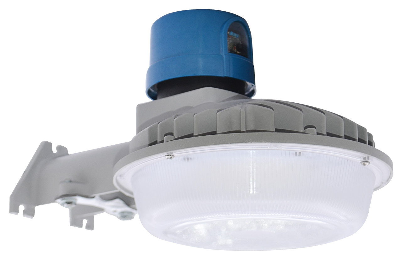 The LED-DDALG40W is a mini dusk-to-dawn security/flood light. It is an ideal solution for general site and flood lighting in commercial and residential settings. With a die cast aluminum housing and a fluted, polycarbonate lens shield to reduce glare, the LED-DDALG40W provides effective, economical security lighting. High-efficacy, long-life LEDs provide both energy and maintenance cost savings compared to traditional, incandescent and HID security/flood lights.

▪ Available in 5000k (cool white) color temperature.*
▪ Long-life LEDs provide 153,000 hours of operation with at least 70% of initial lumen output (L70).**
▪ Delivers 4,805 lumens and 123 lumens per watt.*
▪ Universal 120-277 AC voltage (50-60Hz) is standard.
▪ Power factor > 0.90.
▪ Total harmonic distortion < 20%.
▪ Color rendering index > 80.
▪ Die cast aluminum housing.
▪ Fluted, polycarbonate lens shield to reduce glare.
▪ NEMA-type photocell included (120-277V).
▪ Easy installation in new construction or retrofit.