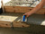 Person using a MARSHALLTOWN rubber float on a concrete surface