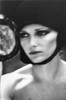 1970's fashion shoot with super model Cheryl Tiegs looking in the mirror